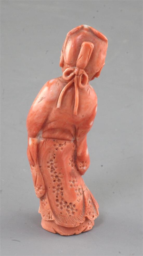 A Chinese coral figure of a sage, mid 20th century, height 9.4cm